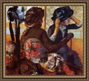 Edgar Framed Paintings - At the Milliners by Edgar Degas