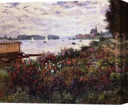 A Picnic on The Riverbank Canvas Paintings - Riverbank at Argenteuil by Claude Monet