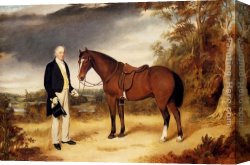 Gentleman Canvas Paintings - A Gentleman Holding a Chestnut Hunter in a Wooded Landscape by William Webb
